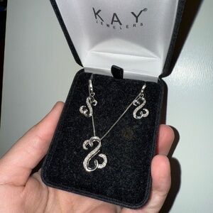 Jane Seymour open hearts necklace and earring set.